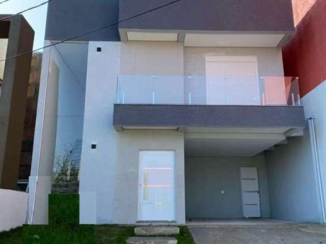 Casa em condomínio fechado com 3 quartos à venda na Rua Luiz Carlos Soares de Paiva, 35, Lomba do Pinheiro, Porto Alegre por R$ 650.000