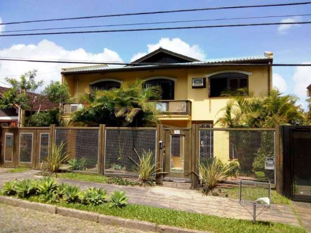 Casa com 3 quartos à venda na Rua Monte Alverne, 361, Chácara das Pedras, Porto Alegre por R$ 1.490.000
