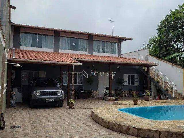 Casa com 4 dormitórios à venda, 247 m² por R$ 986.000,00 - Porto Novo - Caraguatatuba/SP