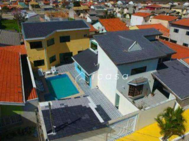 Sobrado com 5 dormitórios à venda, 380 m² por R$ 795.000,00 - Village das Flores - Caçapava/SP
