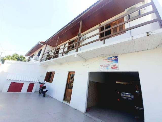 Casa com 5 quartos à venda no Harmonia, Canoas , 200 m2 por R$ 450.000