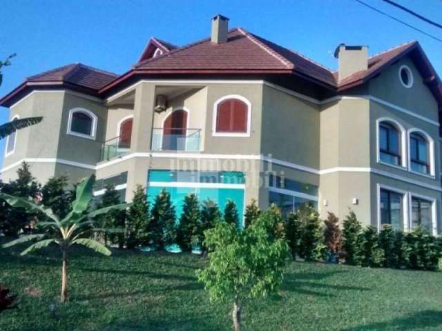Casa com 4 dormitórios, 480 m² - venda por R$ 3.900.000,00 ou aluguel por R$ 16.750,00/mês - Residencial Morada dos Lagos - Barueri/SP