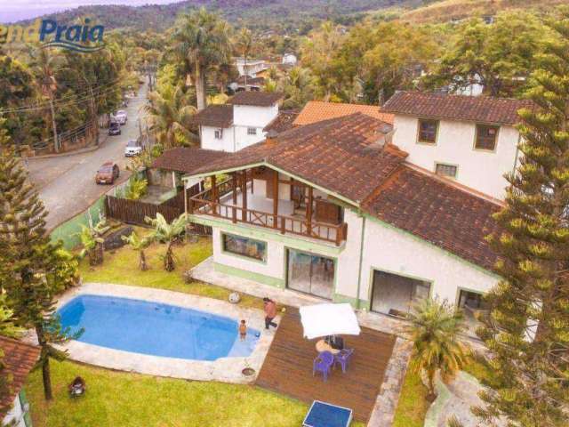 Casa em ampla terreno com 4 suítes à venda, 593 m² por R$ 12.000.000 - Água Branca - Ilhabela/SP