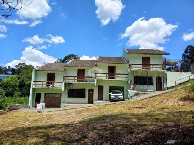 Casa com 2 quartos à venda na Avenida dos Girassóis, 538, Charqueadas, Caxias do Sul, 69 m2 por R$ 249.990