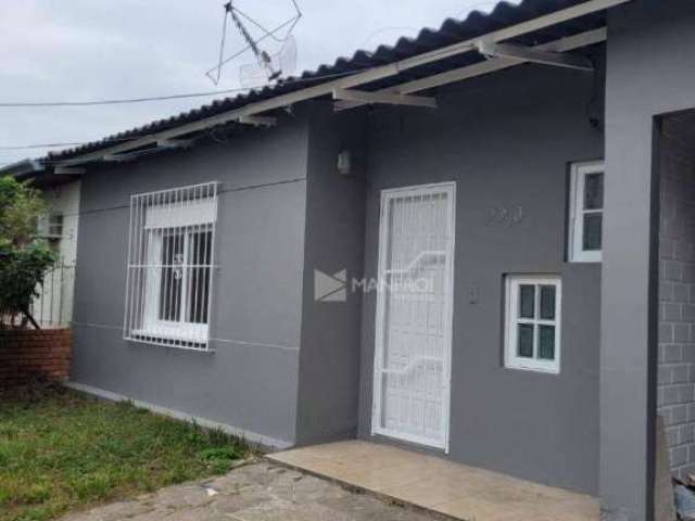 Casa com 4 dormitórios à venda por R$ 395.000,00 - Harmonia - Canoas/RS