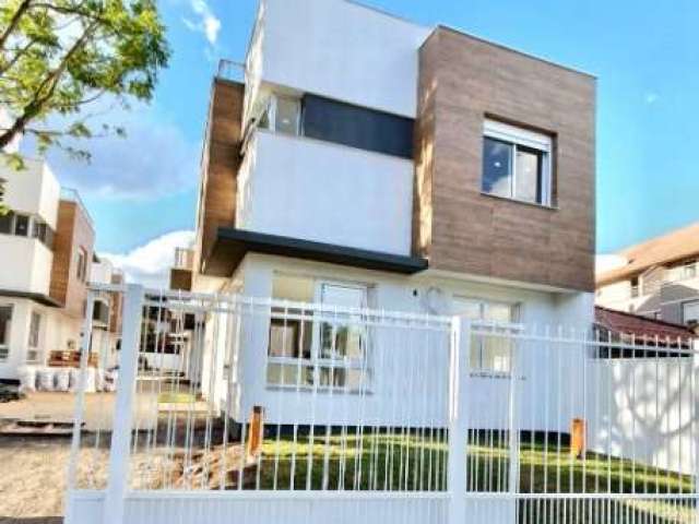 Casa em condomínio fechado com 3 quartos à venda na Vila Assunção, Porto Alegre  por R$ 1.250.000