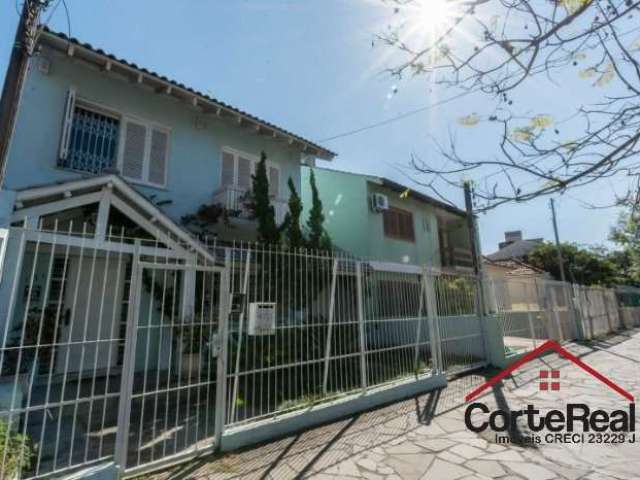 Casa com 3 quartos à venda na Rua Barão de Cerro Largo, 151, Menino Deus, Porto Alegre por R$ 1.290.000