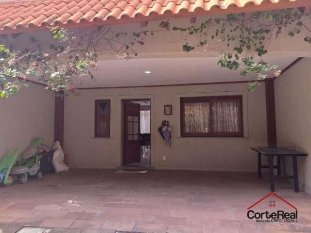 Casa com 3 quartos à venda na Rua Gilberto Laste, 141, Santa Tereza, Porto Alegre por R$ 880.000