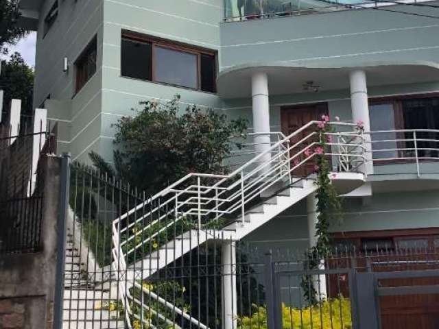 Casa com 3 quartos à venda na Rua Pedro Carneiro Pereira, 115, Teresópolis, Porto Alegre por R$ 2.500.000
