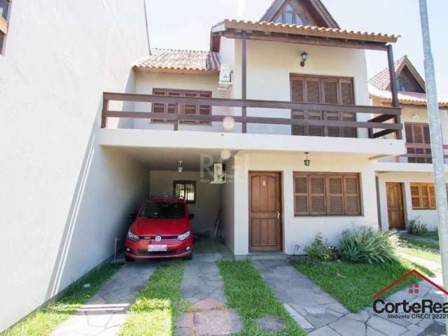 Casa em condomínio fechado com 3 quartos à venda na Avenida Orleaes, 105, Guarujá, Porto Alegre por R$ 450.000