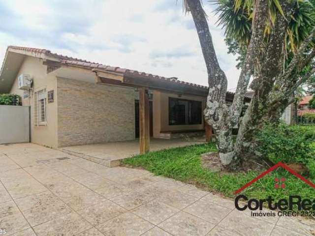 Casa com 3 quartos à venda na Rua Conrado Ferrari, 109, Jardim Isabel, Porto Alegre por R$ 1.075.000