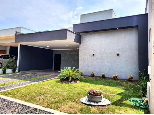 Casa em condomínio fechado com 3 quartos à venda na Avenida Jacarandá, Residencial Village Damha II, Araraquara, 147 m2 por R$ 950.000
