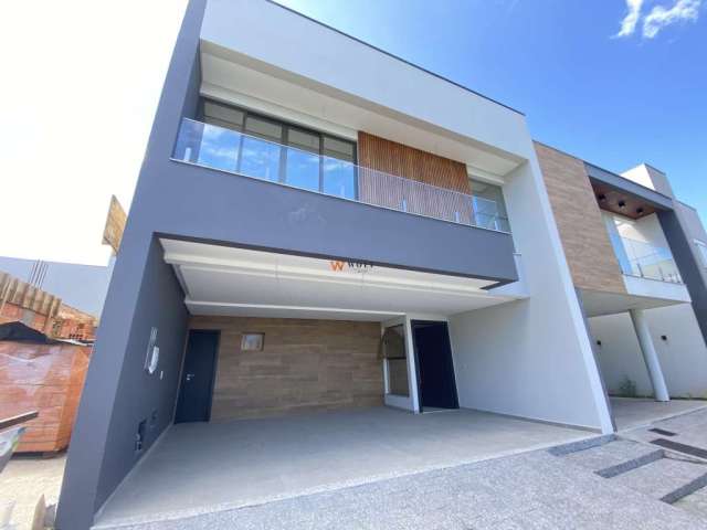 Casa em condomínio fechado com 3 quartos à venda na Avenida Deltaville, 150, Beira Rio, Biguaçu por R$ 1.145.000