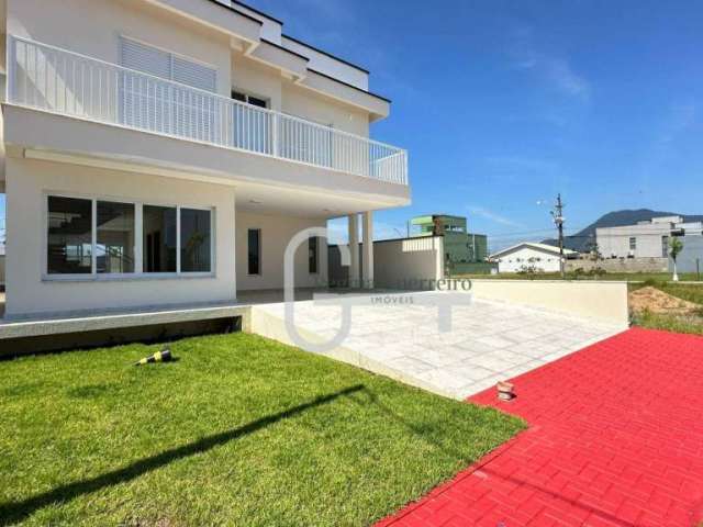 Casa com 4 dormitórios à venda, 255 m² por R$ 1.680.000,00 - Condomínio Flora Rica - Peruíbe/SP