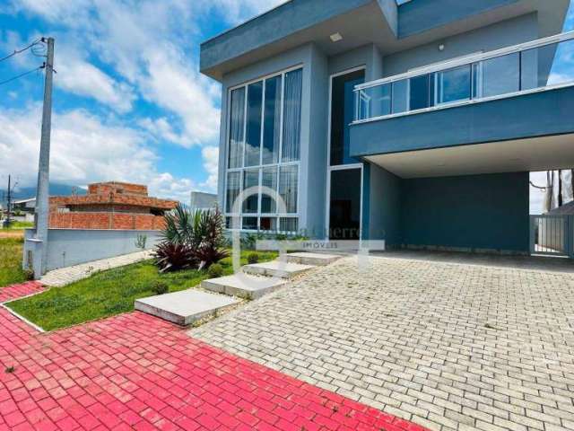 Casa com 4 dormitórios à venda, 212 m² por R$ 1.700.000,00 - Condomínio Flora Rica - Peruíbe/SP