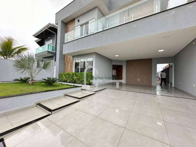 Casa com 4 dormitórios à venda, 280 m² por R$ 1.400.000,00 - Condomínio Flora Rica - Peruíbe/SP