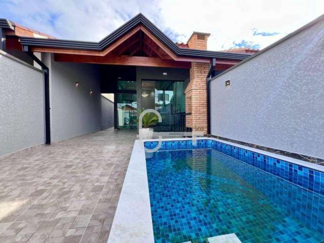 Casa nova e com piscina à venda em Peruíbe, no bairro Jardim Ribamar.