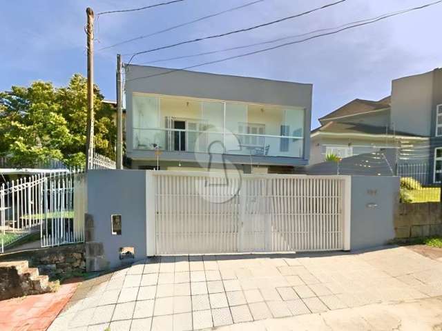 Casa em condomínio fechado com 4 quartos à venda no Scharlau, São Leopoldo  por R$ 699.000