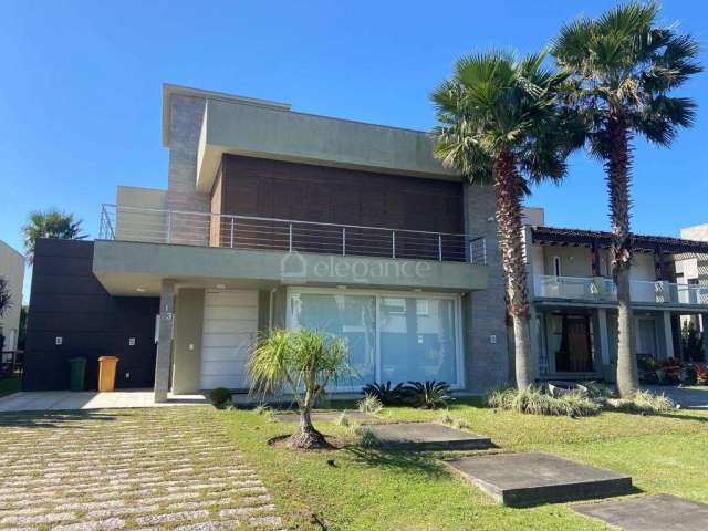 Casa em condomínio fechado com 5 quartos à venda na Homero Ribeiro, 5, Remanso, Xangri-Lá por R$ 2.950.000