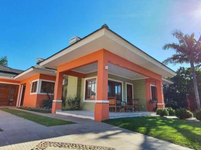 Casa em condomínio fechado com 4 quartos à venda na Guatapi, 941, Atlântida, Xangri-Lá por R$ 1.390.000