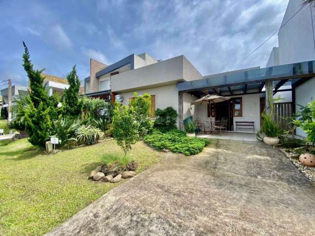 Casa em condomínio fechado com 4 quartos à venda na Central, 1100, Noiva Do Mar, Xangri-Lá por R$ 1.100.000