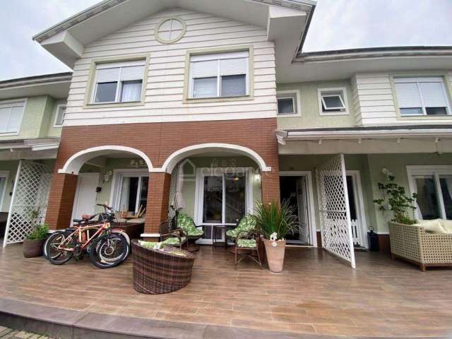 Casa em condomínio fechado com 2 quartos à venda na Avenida Paraguassu, 20, Centro, Xangri-Lá por R$ 850.000