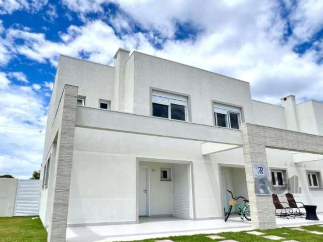 Casa à venda em Condomínio Pateo Marbela, localizada na Rua Jose Bruno Klein, 667, no bairro Remanso, Xangri-Lá. Com 113m² de área privativa, a casa possui 3 quartos, sendo 1 suíte, e 3 banheiros soci