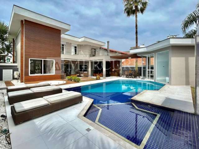 Casa em condomínio fechado, com 5 quartos (5 suítes), 525 m² à venda por R$ 6.500.000  - Jardim Acapulco - Guarujá/SP - Imobiliária Mercuri