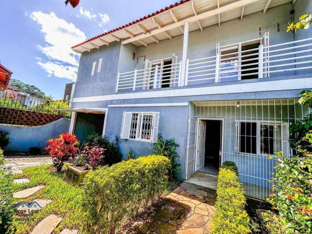 Casa 4 dormitórios à venda Cavalhada Porto Alegre/RS
