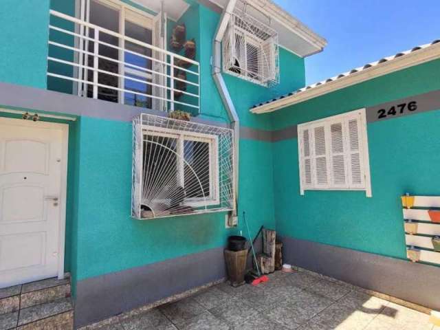 Casa com 2 quartos à venda na Rua João Triches, Pio X, Caxias do Sul por R$ 450.000