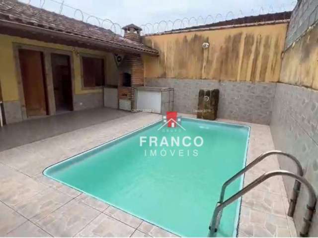 Casa com 2 dormitórios à venda, 130 m² por R$ 690.000,00 - Caiçara - Praia Grande/SP
