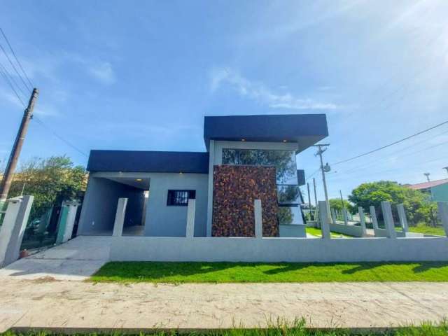 Casa com 3 quartos à venda na Avenida Adalberto, 234, Guarani, Capão da Canoa por R$ 890.000