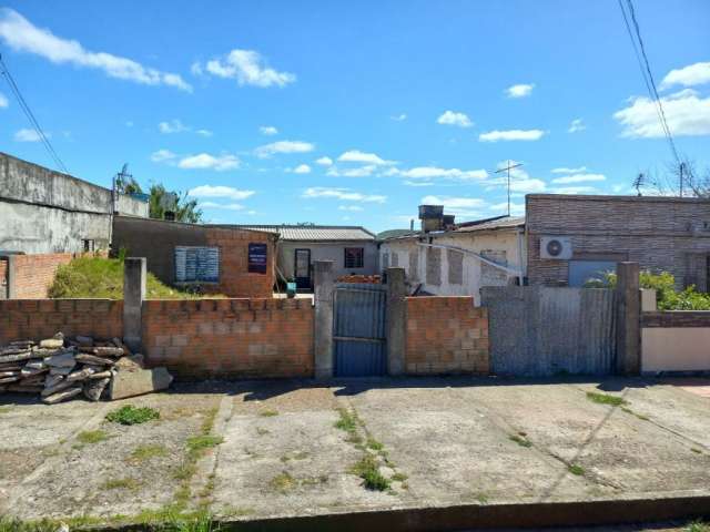 Terreno com casa sem terminar por R$130.000,00 , próximo Praça Artigas em Santana do Livramento