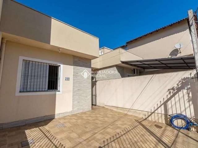 Casa com 2 quartos à venda na Avenida do Comércio, 240, Morada do Vale II, Gravataí, 56 m2 por R$ 248.000