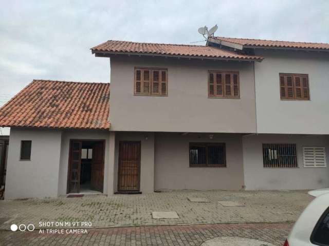 Casa com 3 quartos à venda na Rua Vereador Serapião Goulart, 693, Bela Vista, Alvorada, 160 m2 por R$ 370.000