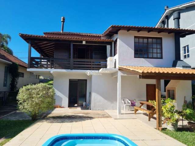 Casa em condomínio fechado com 3 quartos à venda na Estrada Capitão Gentil Machado de Godoy, 4500, Vila Elsa, Viamão, 675 m2 por R$ 800.000