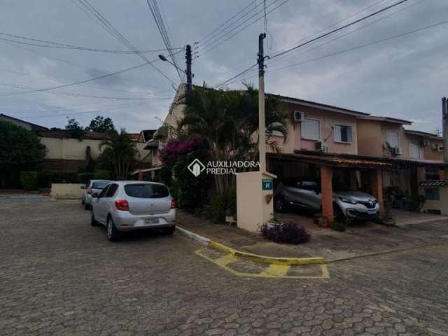 Casa em condomínio fechado com 2 quartos à venda na Estrada Frederico Dihl, 1001, Bela Vista, Alvorada, 57 m2 por R$ 392.200