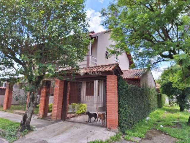 Casa com 3 quartos à venda na Rua Papa João Paulo II, 5, Jardim Algarve, Alvorada, 180 m2 por R$ 480.000