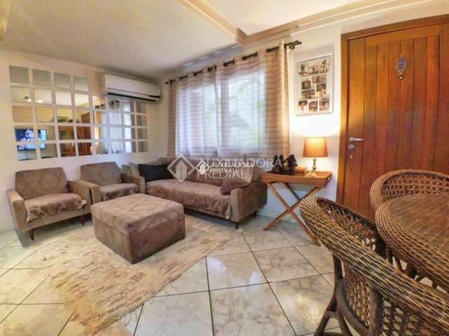Casa em condomínio fechado com 2 quartos para alugar na Avenida Alcides Maia, 428, Sarandi, Porto Alegre, 88 m2 por R$ 2.400