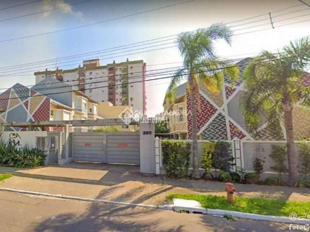 Casa em condomínio fechado com 2 quartos à venda na Rua Antônio Fonseca Barcelos, 200, Marechal Rondon, Canoas, 117 m2 por R$ 430.000