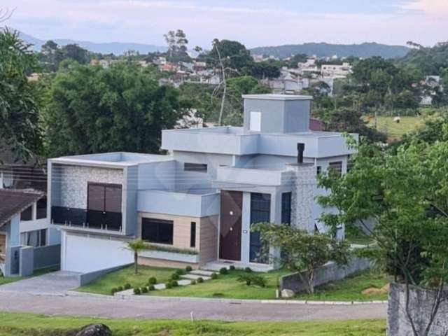 Casa em condomínio fechado com 4 quartos à venda na Rua Leonel Pereira, 2033, Cachoeira do Bom Jesus, Florianópolis por R$ 2.450.000