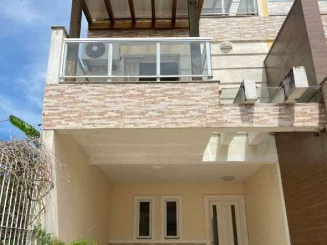Casa com 3 quartos à venda na Rua Danton Krás Borges, Guarujá, Porto Alegre, 165 m2 por R$ 645.000
