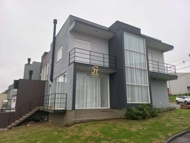 Casa em condomínio fechado com 3 quartos à venda na Rua Antônio Baggio, 100, Loteamento Jardim Timbaúva, Gravataí por R$ 850.000