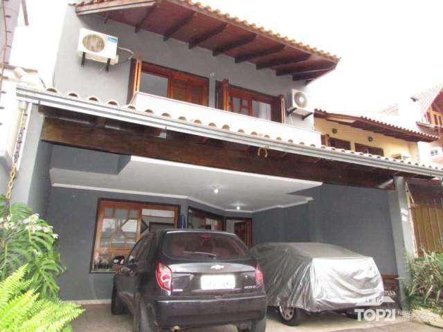 Casa com 3 quartos à venda na Ecoville, 730, Ecoville, Porto Alegre por R$ 960.000