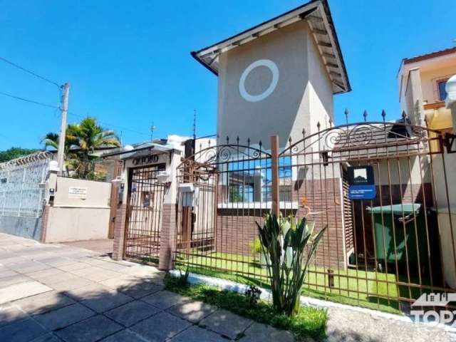 Casa em condomínio fechado com 3 quartos à venda na Rua Augusto Attílio Giordani, 87, São Sebastião, Porto Alegre por R$ 650.000