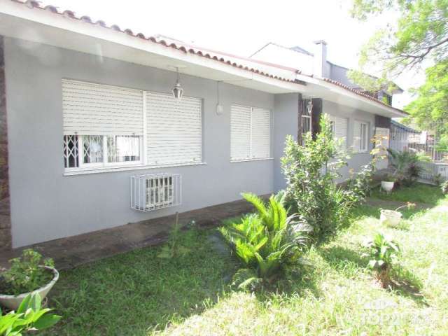 Casa comercial com 8 salas à venda na Rua Engenheiro Frederico Dahne, 565, Sarandi, Porto Alegre por R$ 1.200.000