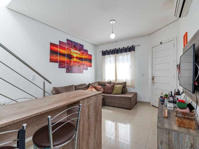 Casa em condomínio fechado com 2 quartos à venda na Rua Doutor Pereira Neto, 925, Tristeza, Porto Alegre por R$ 350.000