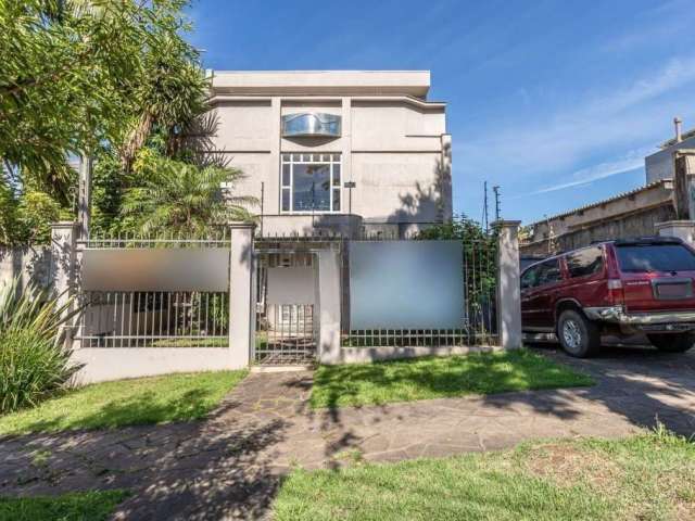 Casa com 3 quartos à venda na Rua João Berutti, 118, Chácara das Pedras, Porto Alegre por R$ 1.290.000