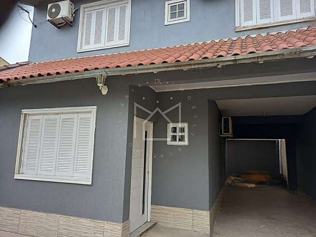 Casa com 3 quartos à venda na Rua Madre Teresa de Calcutá, 445, Loteamento Auxiliadora, Gravataí, 129 m2 por R$ 317.000