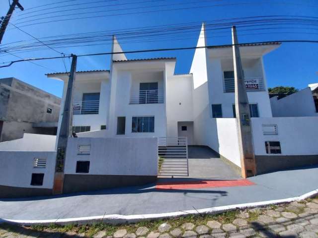 Geminado à venda em Potécas, São José - SC | Com Varanda